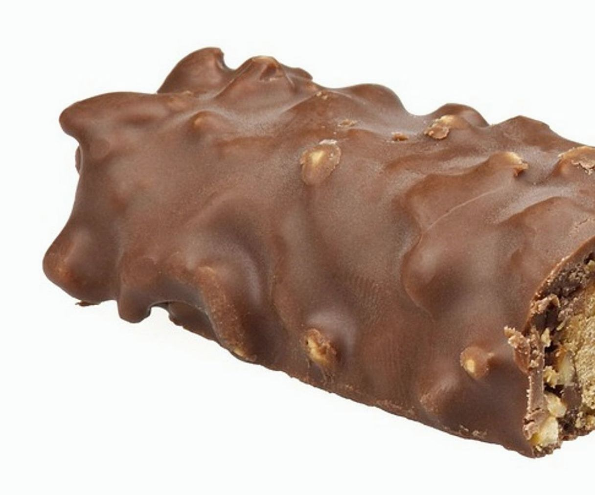 Manos preparando dulces artesanales con precisión